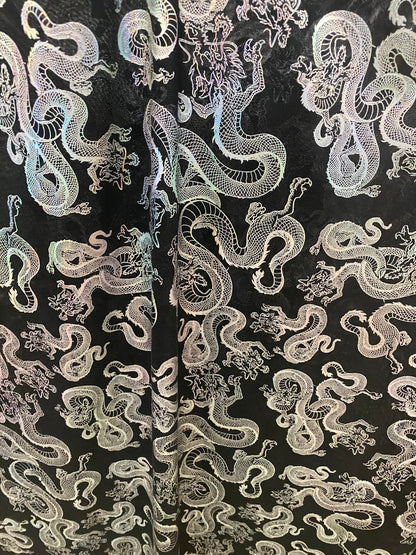 New Exotic Dragon design print on metallic power mesh nylon spandex 4-way stretch 58/60” Sold by the YD. Ships worldwide