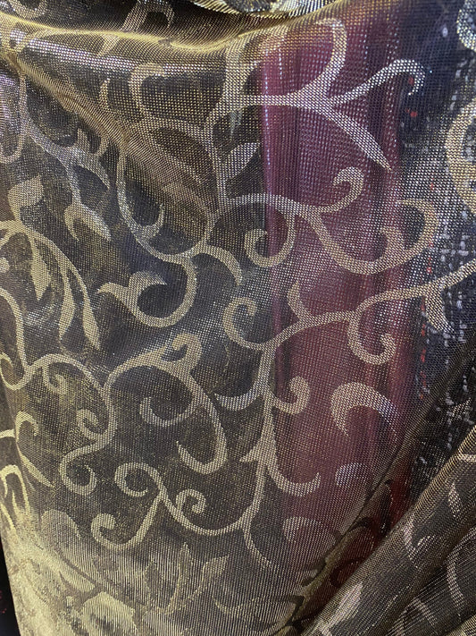 New Swirl design metallic mesh two tone gold 4-way stretch 58/60” Sold by the YD. Ships worldwide from Los Angeles California USA.