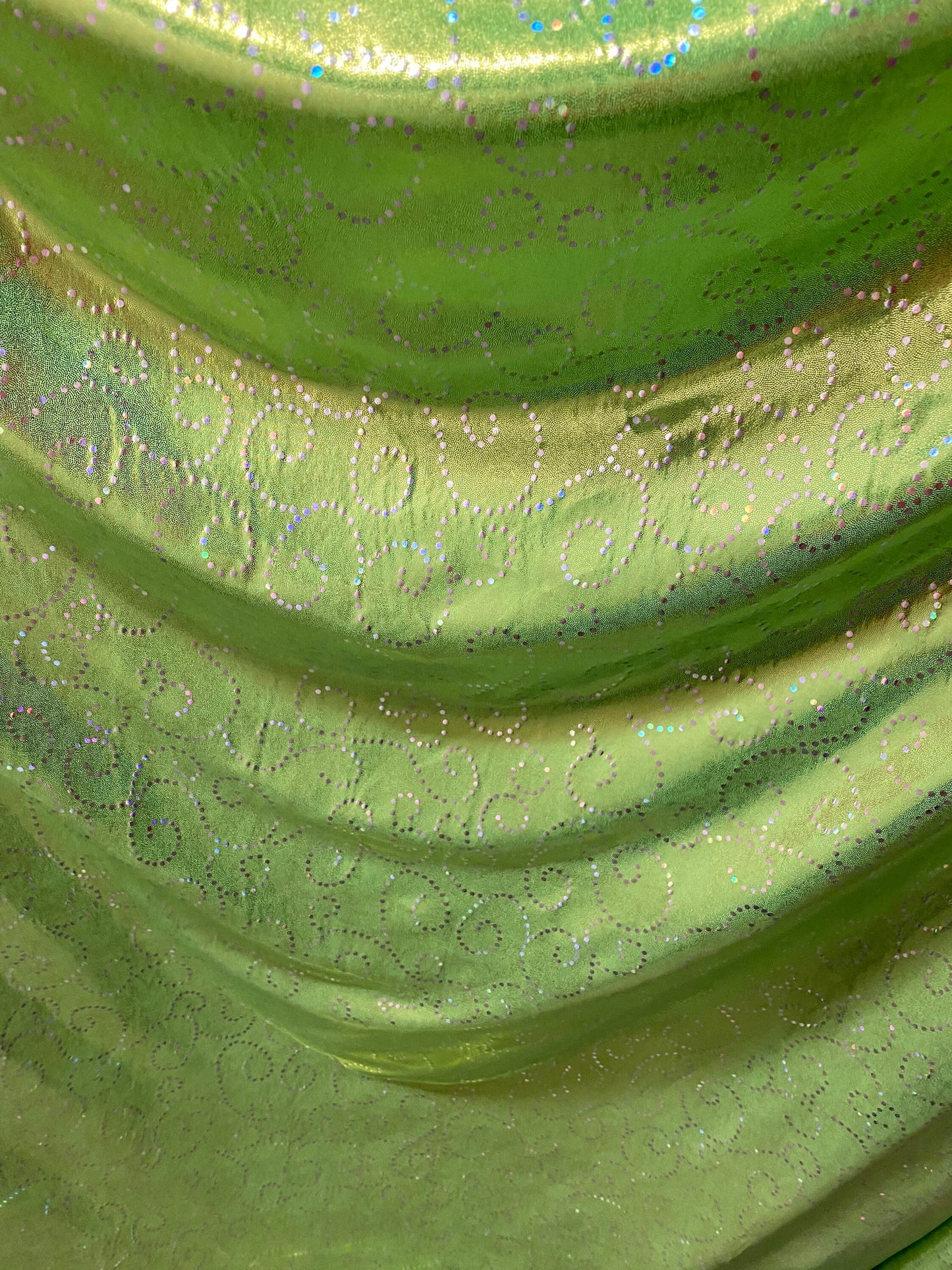 New Swirl design print on poly spandex with foggy foil 4-way stretch medium weight 58/60” Sold by the YD. Ships Worldwide