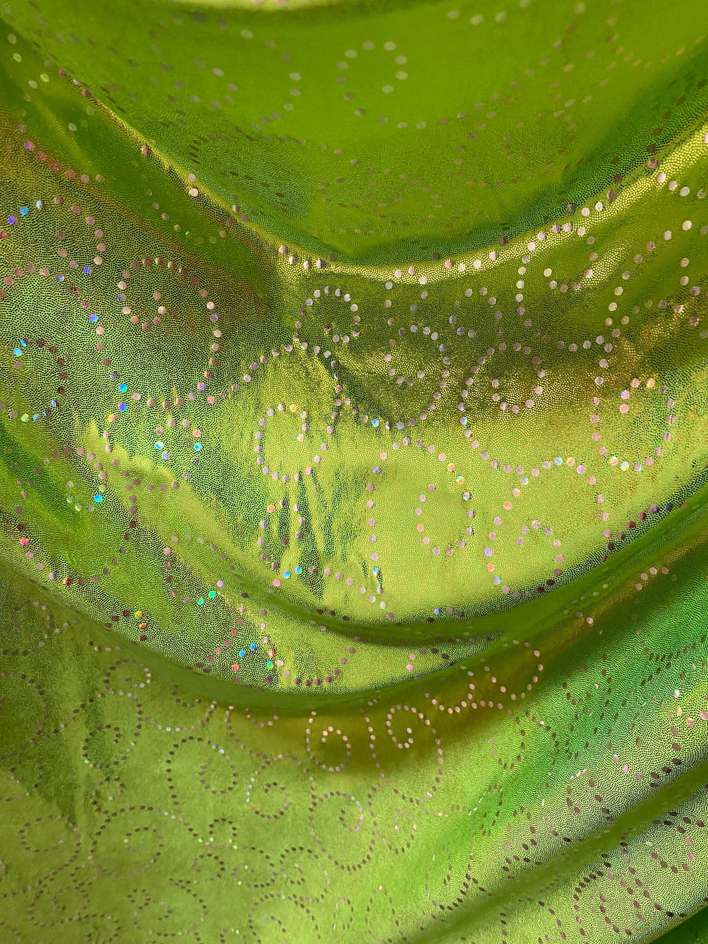 New Swirl design print on poly spandex with foggy foil 4-way stretch medium weight 58/60” Sold by the YD. Ships Worldwide