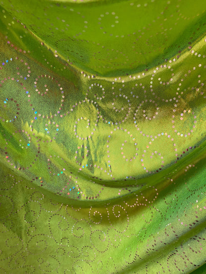 New Swirl design print on poly spandex with foggy foil 4-way stretch medium weight 58/60” Sold by the YD. Ships Worldwide