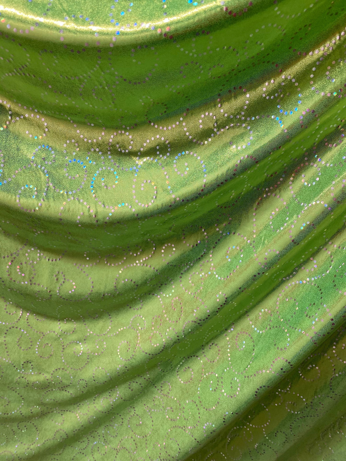 New Swirl design print on poly spandex with foggy foil 4-way stretch medium weight 58/60” Sold by the YD. Ships Worldwide