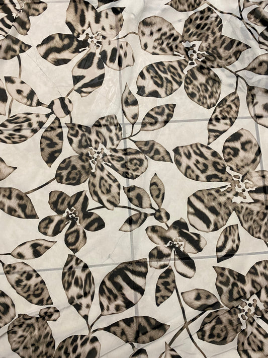 New Exotic flower animal print design on poly mesh 4-way stretch 58/60” Sold by the YD. Ships Worldwide from Los Angeles California USA.