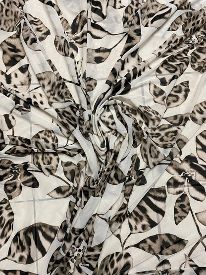New Exotic flower animal print design on poly mesh 4-way stretch 58/60” Sold by the YD. Ships Worldwide from Los Angeles California USA.