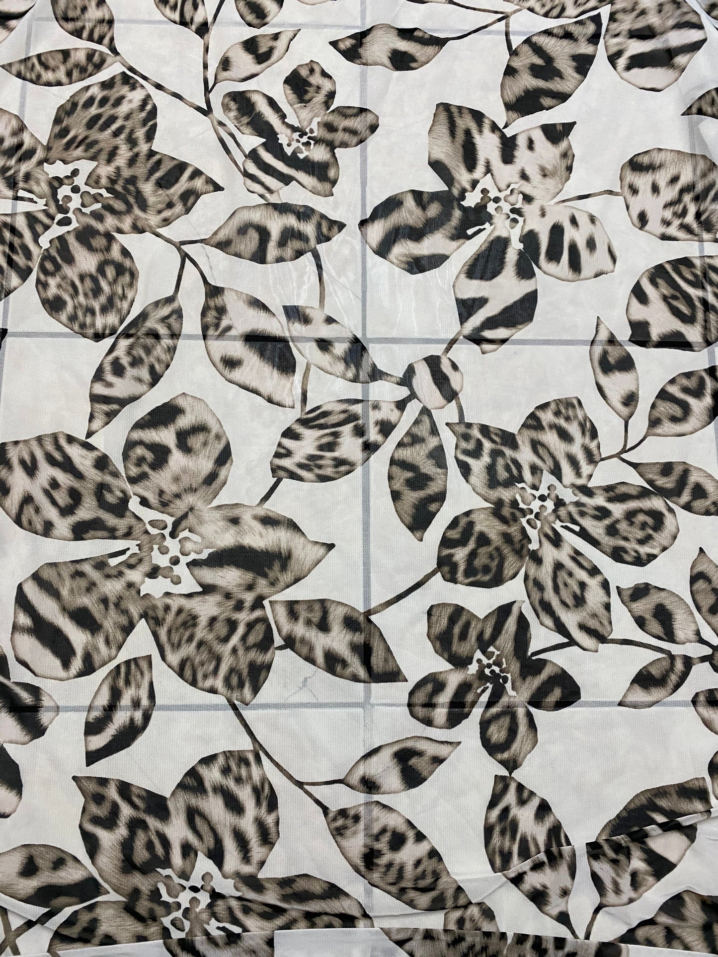 New Exotic flower animal print design on poly mesh 4-way stretch 58/60” Sold by the YD. Ships Worldwide from Los Angeles California USA.