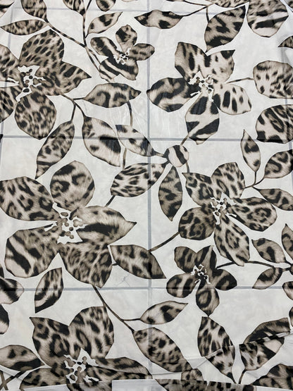 New Exotic flower animal print design on poly mesh 4-way stretch 58/60” Sold by the YD. Ships Worldwide from Los Angeles California USA.