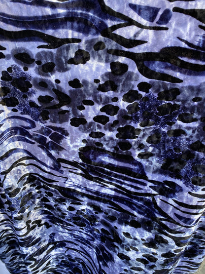 New Exotic animal print on stretch velvet 4-way stretch 58/60” Sold by the YD. Ships Worldwide from Los Angeles California USA.