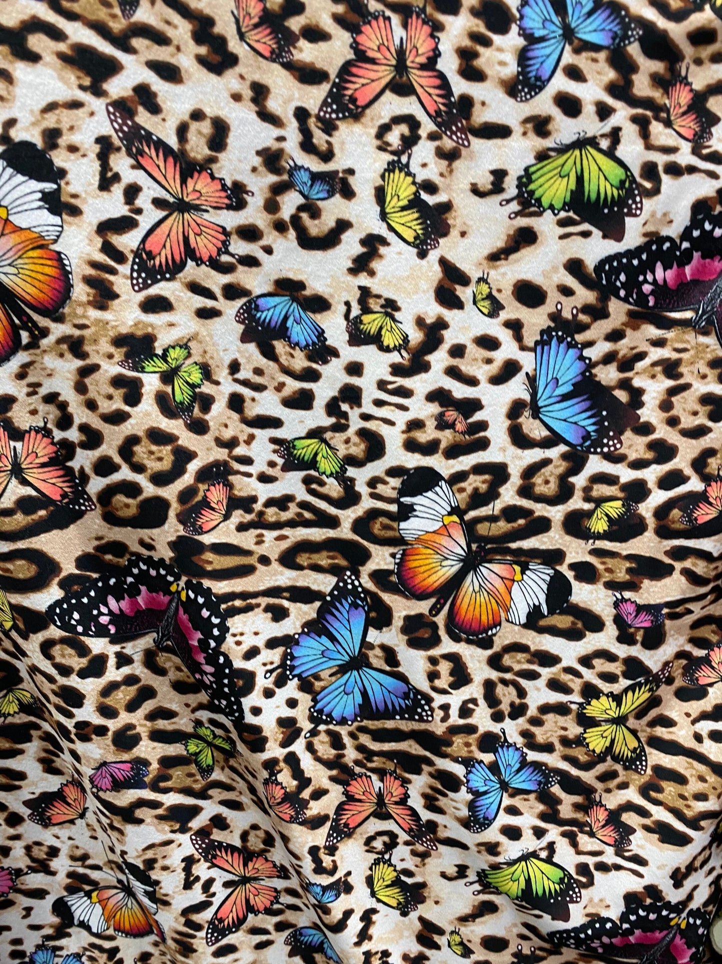 New butterfly design print on soft poly cotton spandex 4-way stretch 58/60” Sold by the YD. Ships Worldwide from Los Angeles California USA.