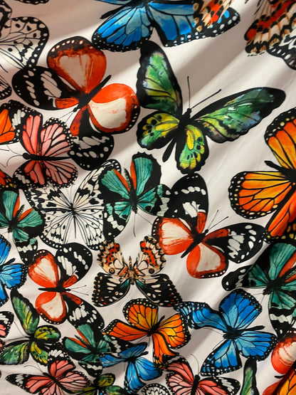 New Butterfly design multicolor print on poly cotton spandex 4-way stretch 58/60” Sold by the YD. Ships worldwide from Los Angeles cali