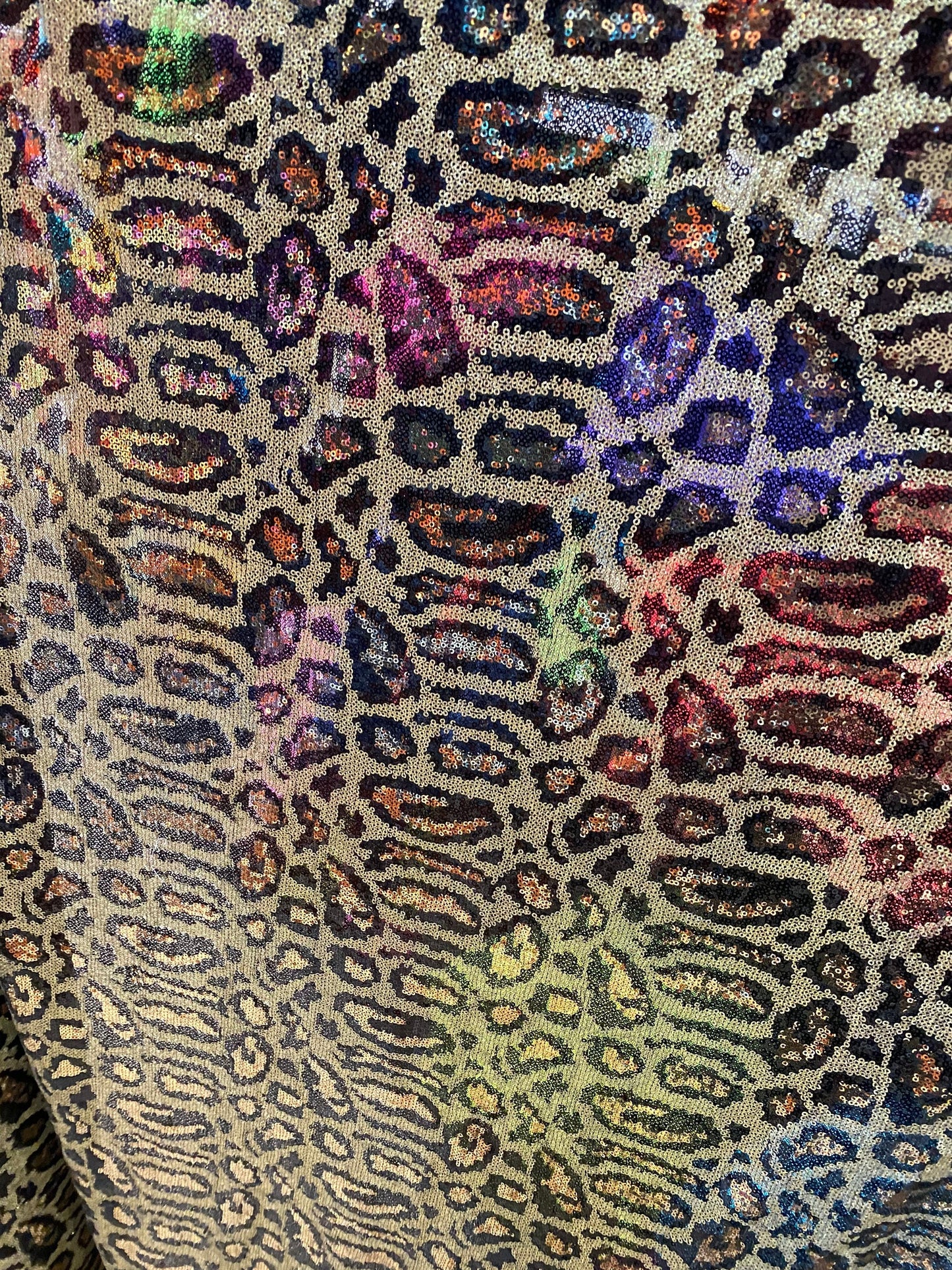 New Exotic leopard design print on mini glitz cosmic sequins embroidered on non-stretch mesh 58/60” Sold by the YD.