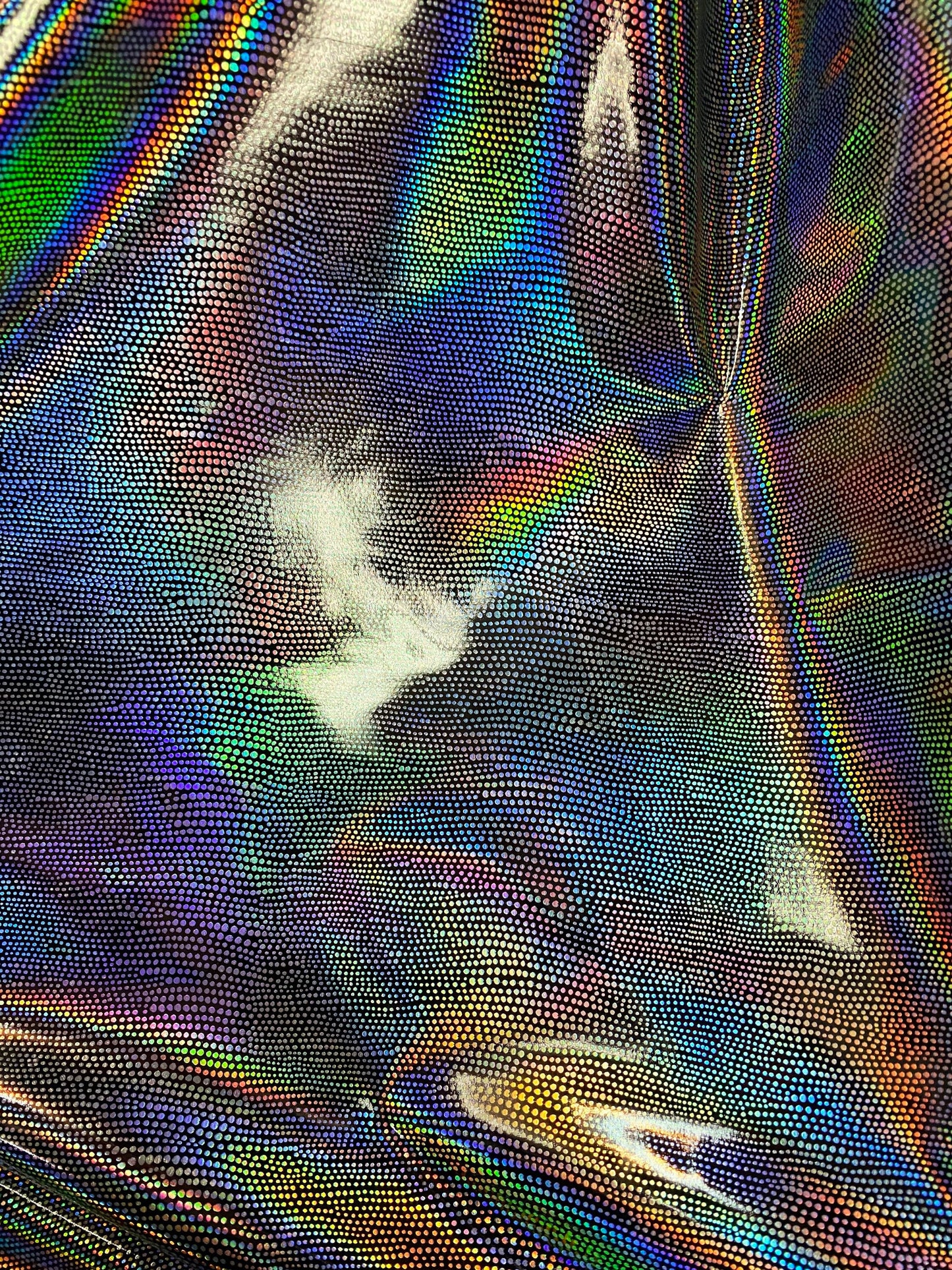 New iridescent Exotic Armadillo design hologram foil pu vinyl black/silver  2-way stretch medium weight 58/60” Sold by the YD.