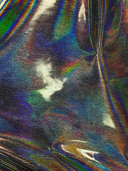 New iridescent Exotic Armadillo design hologram foil pu vinyl black/silver  2-way stretch medium weight 58/60” Sold by the YD.