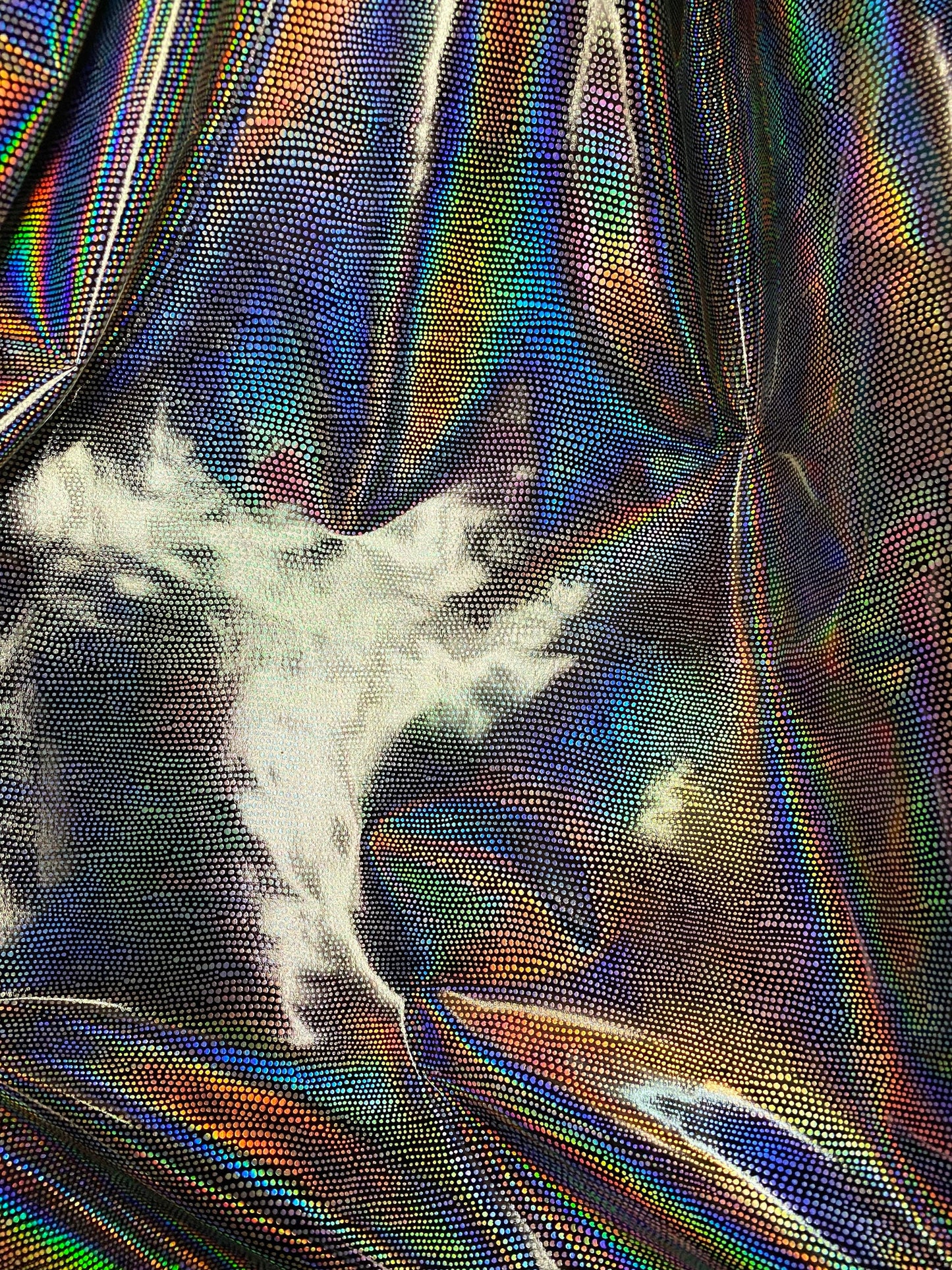 New iridescent Exotic Armadillo design hologram foil pu vinyl black/silver  2-way stretch medium weight 58/60” Sold by the YD.