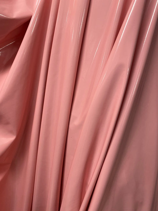 Shiny Latex  dusty rose color nylon spandex 4way stretch 58/60” Sold by the YD. Ships worldwide from Los Angeles California USA.