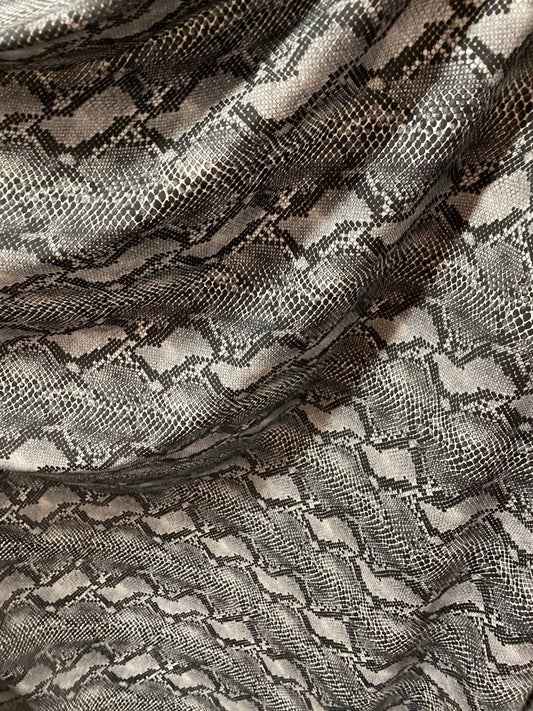 Cobra design Exotic serpent skin print on best quality of nylon spandex 4-way stretch 58/60” Sold by the YD. Ships Worldwide from Los CA.