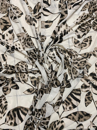 New Exotic flower animal print design on poly mesh 4-way stretch 58/60” Sold by the YD. Ships Worldwide from Los Angeles California USA.