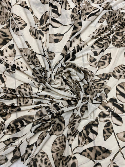New Exotic flower animal print design on poly mesh 4-way stretch 58/60” Sold by the YD. Ships Worldwide from Los Angeles California USA.