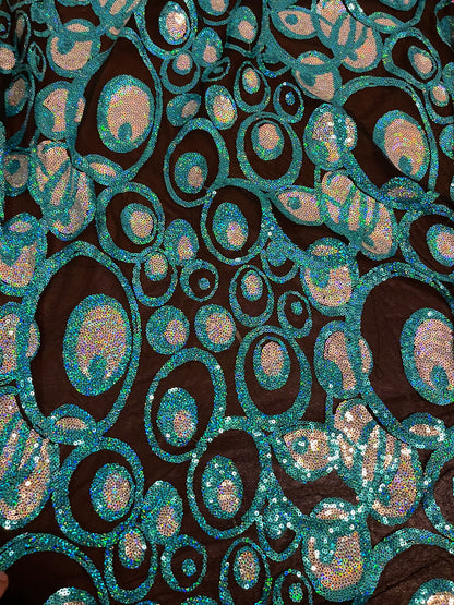 New peacock design hologram sequins embroidered on stretch mesh 2-way stretch 58/60” Sold by the YD. Ships Worldwide from Los Angeles CA USA