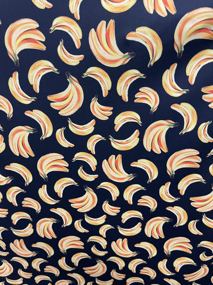 Bananas design black/yellow print on best nylon spandex 4way stretch 58/60” Sold by the YD. Ships worldwide from Los Angeles California USA.