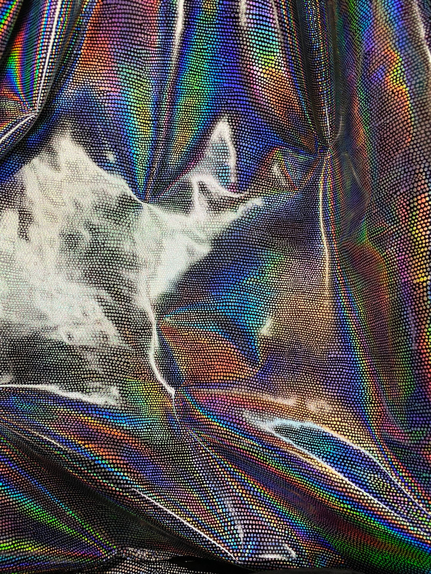 New iridescent Exotic Armadillo design hologram foil pu vinyl black/silver  2-way stretch medium weight 58/60” Sold by the YD.