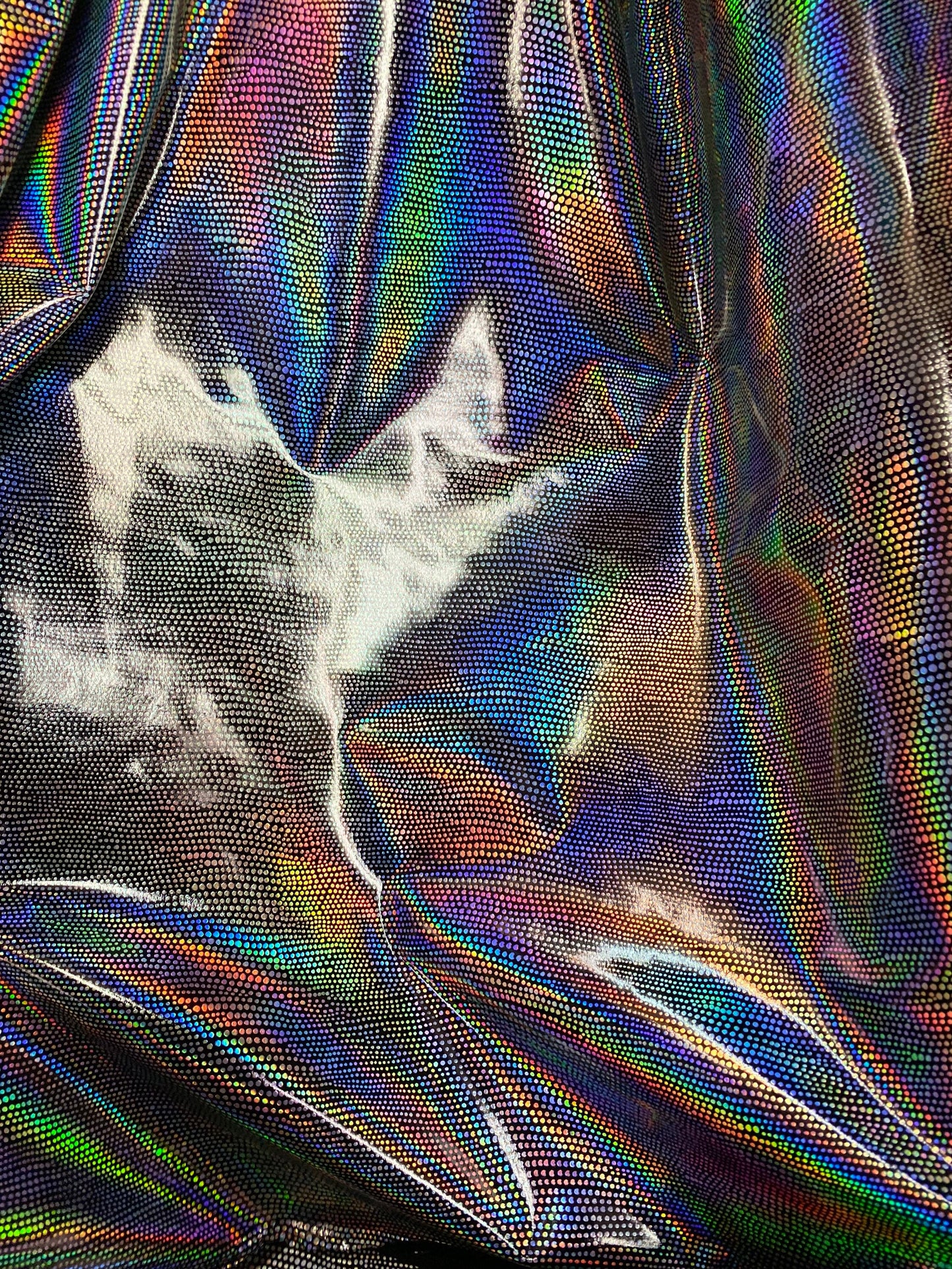 New iridescent Exotic Armadillo design hologram foil pu vinyl black/silver  2-way stretch medium weight 58/60” Sold by the YD.