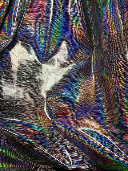 New iridescent Exotic Armadillo design hologram foil pu vinyl black/silver  2-way stretch medium weight 58/60” Sold by the YD.