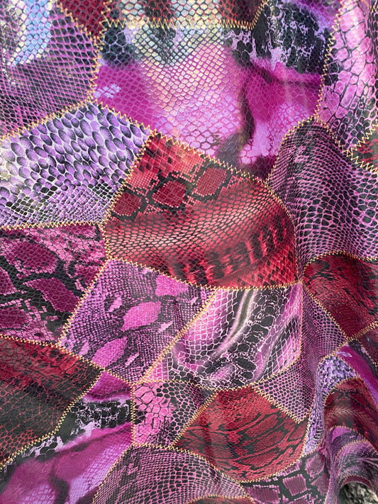 New Exotic multi snake design print on poly interlock with clear foil non stretch 58/60” Sold by the YD. Ships Worldwide from Los Angeles CA
