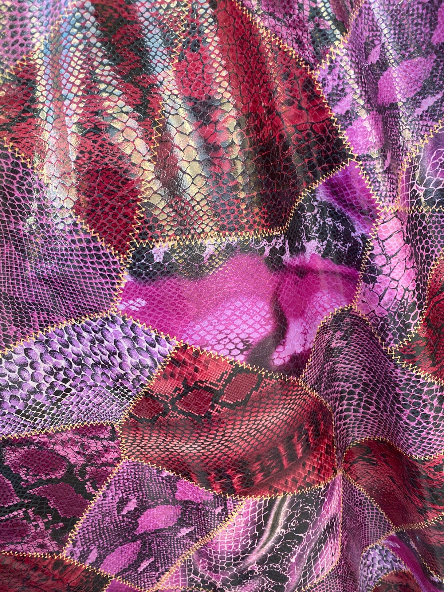 New Exotic multi snake design print on poly interlock with clear foil non stretch 58/60” Sold by the YD. Ships Worldwide from Los Angeles CA