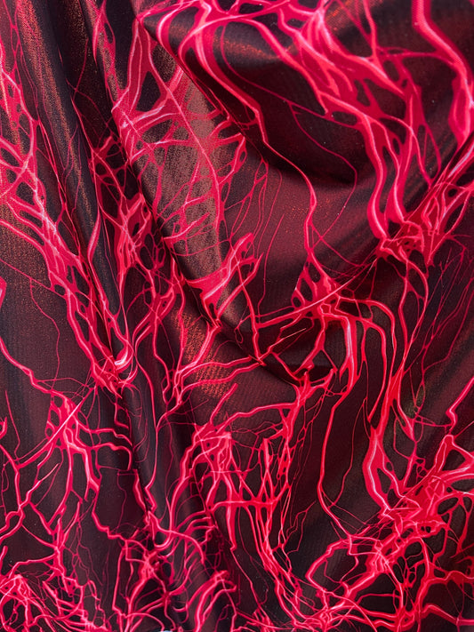 Thunderbolt design print on metallic nylon spandex 4way Stretch 58/60” Sold by the YD. Ships worldwide from Los Angeles California USA.