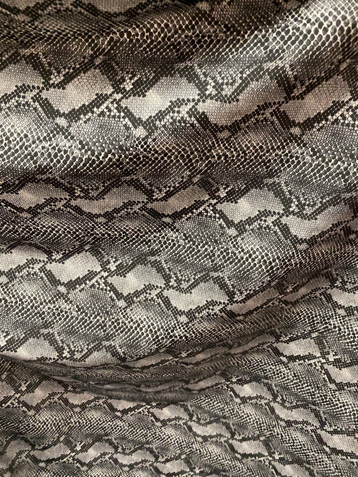 Cobra design Exotic serpent skin print on best quality of nylon spandex 4-way stretch 58/60” Sold by the YD. Ships Worldwide from Los CA.