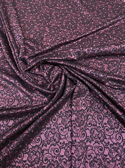 New lace Sofia design plum/black stretch lace with glitter dots 58/60” Sold by the YD. Ships Worldwide from Los Angeles California USA.