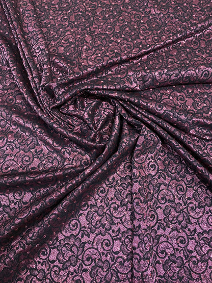 New lace Sofia design plum/black stretch lace with glitter dots 58/60” Sold by the YD. Ships Worldwide from Los Angeles California USA.