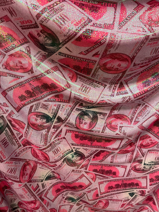 Money design 100 dollars bill print on metallic nylon spandex 4-way stretch 58/60” Sold by the YD. Ships Worldwide from Los Angeles cali.
