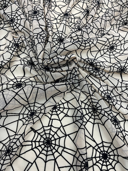 New Spider-Man design nude/back print on power mesh with flocking great quality nylon mesh 4-way stretch 58/60” Sold by the YD.