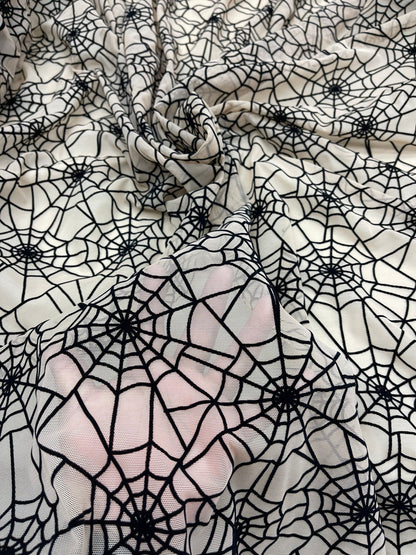 New Spider-Man design nude/back print on power mesh with flocking great quality nylon mesh 4-way stretch 58/60” Sold by the YD.