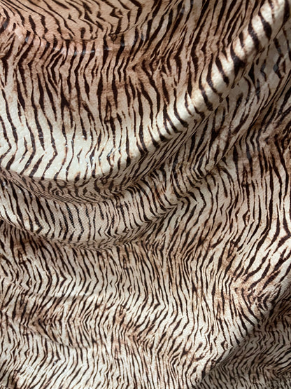 New Exotic Tiger design print on poly spandex 2-way stretch with clear foil 58/60” Sold by the YD. Ships Worldwide from Los Angeles CA