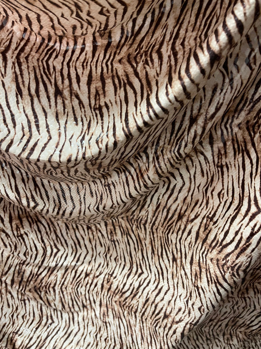 New Exotic Tiger design print on poly spandex 2-way stretch with clear foil 58/60” Sold by the YD. Ships Worldwide from Los Angeles CA