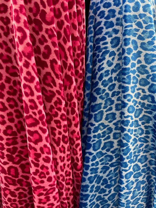 New Exotic leopard design pink and blue color print on heavy stretch velvet 4-way stretch 58/60” Sold by the YD. Ships worldwide