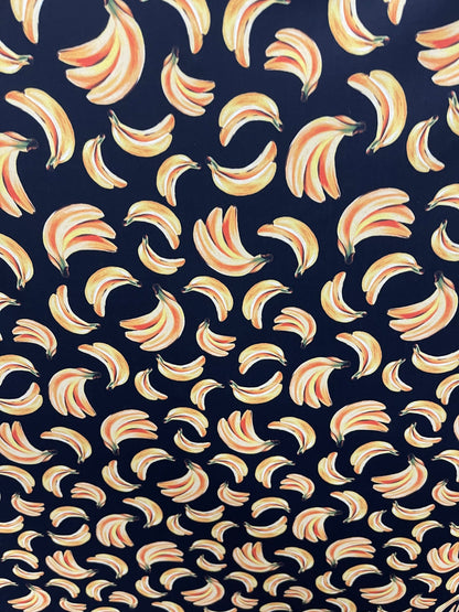 Bananas design black/yellow print on best nylon spandex 4way stretch 58/60” Sold by the YD. Ships worldwide from Los Angeles California USA.