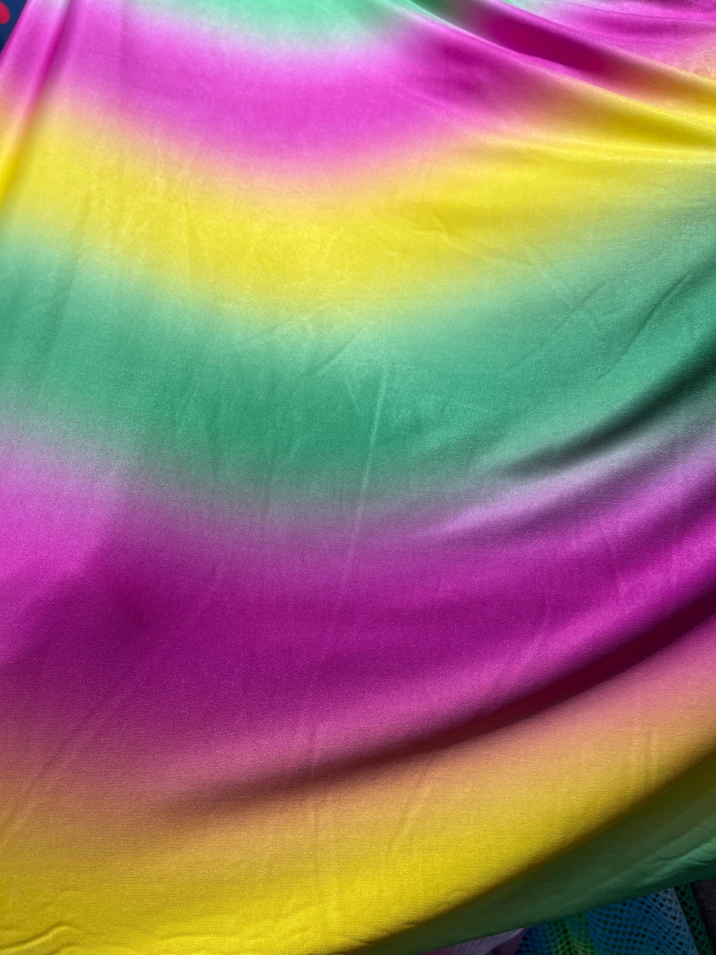 Rainbow design print on poly spandex medium weight 4-way stretch 58/60” Sold by the YD. Ships Worldwide from Los Angeles California USA.
