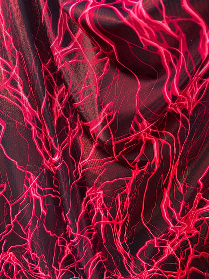 Thunderbolt design print on metallic nylon spandex 4way Stretch 58/60” Sold by the YD. Ships worldwide from Los Angeles California USA.
