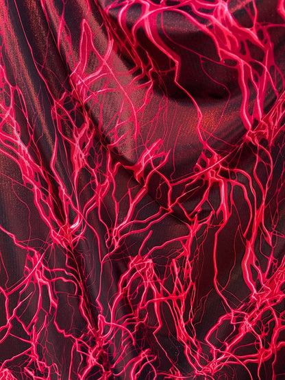 Thunderbolt design print on metallic nylon spandex 4way Stretch 58/60” Sold by the YD. Ships worldwide from Los Angeles California USA.