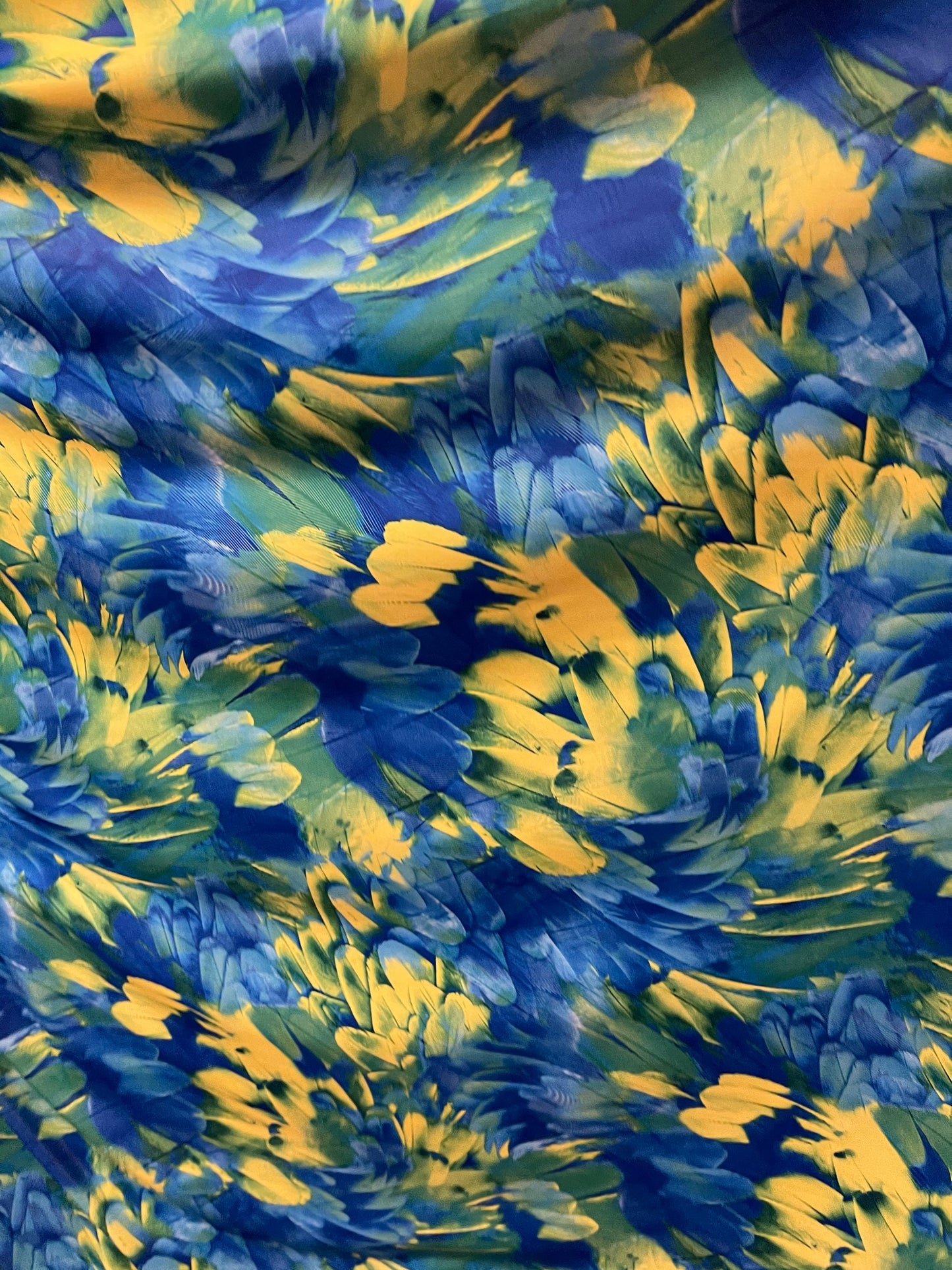 Exotic feathers design blue/green print on best quality of nylon spandex 4-way stretch 58/60” Sold by the YD. Ships Worldwide