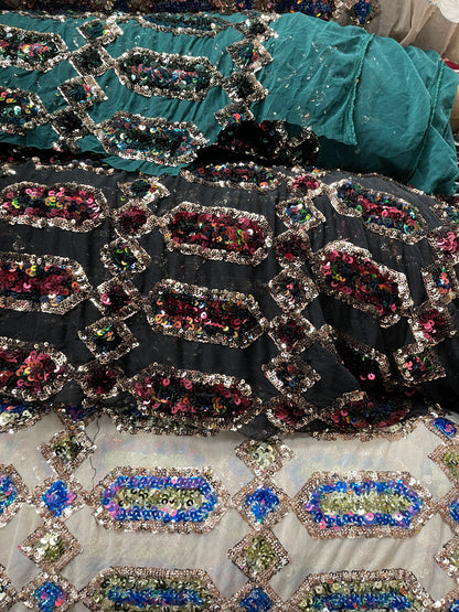 Elegant geometric design iridescent sequins embroidered on stretch mesh 4-way 50/52” Sold by the YD. Ships Worldwide from Los Angeles cali