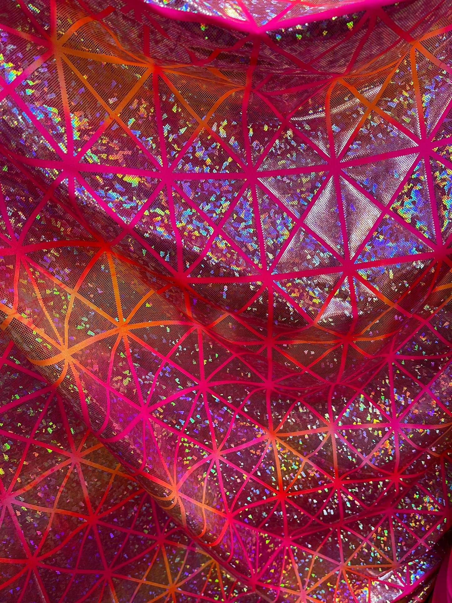 New Geometric design hologram metallic nylon spandex 4-way stretch 58/60” Sold by the YD. Ships Worldwide from Los Angeles California USA.