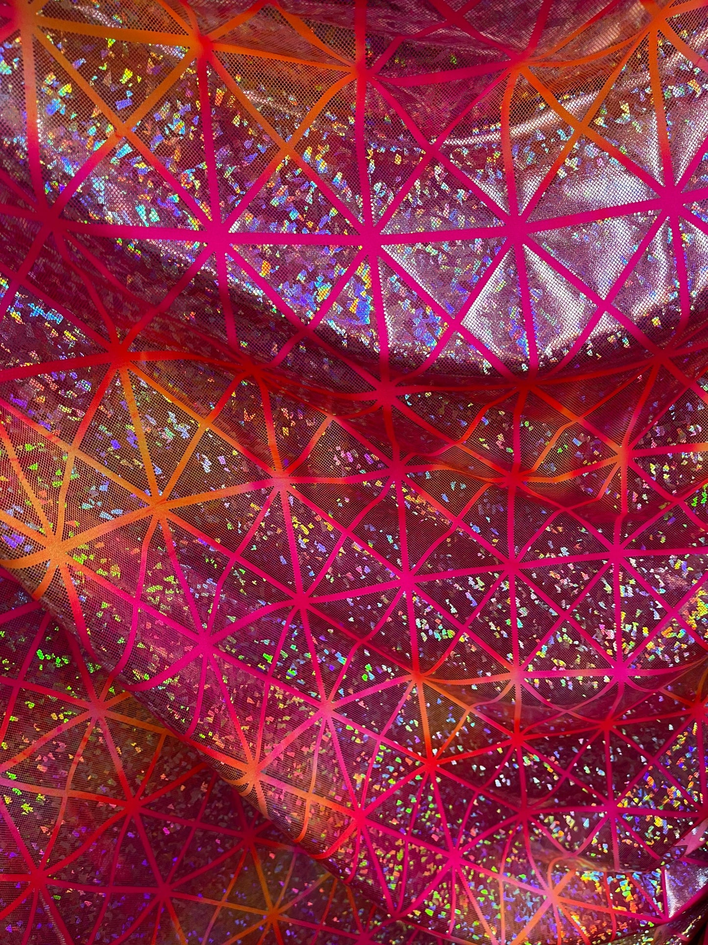 New Geometric design hologram metallic nylon spandex 4-way stretch 58/60” Sold by the YD. Ships Worldwide from Los Angeles California USA.