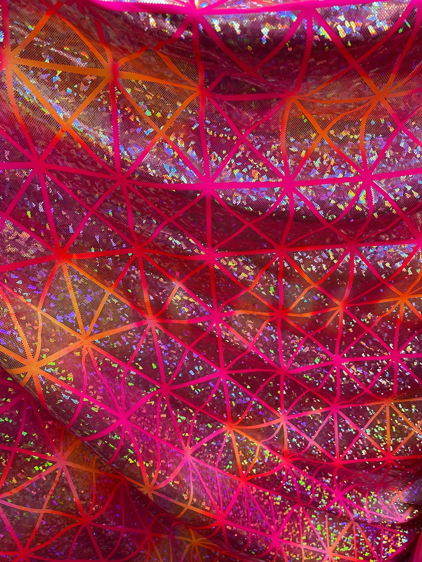 New Geometric design hologram metallic nylon spandex 4-way stretch 58/60” Sold by the YD. Ships Worldwide from Los Angeles California USA.