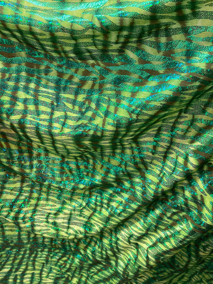 Disco Tiger design exotic hologram animal print metallic spandex 2-way stretch 58/60” Sold by the YD. Ships Worldwide from Los Angeles cali