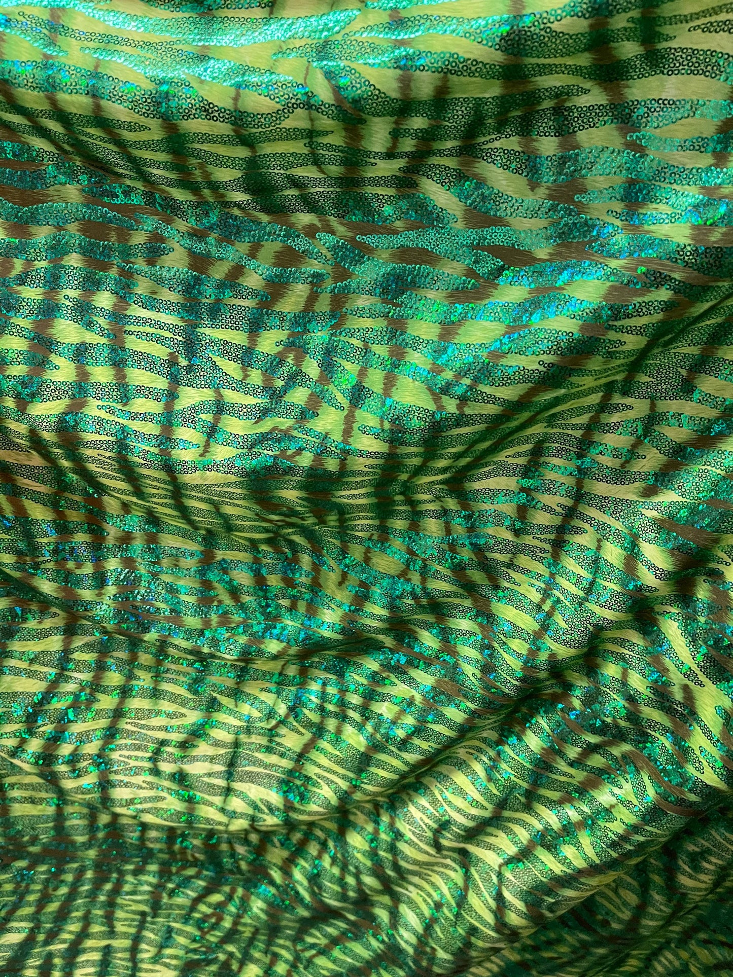 Disco Tiger design exotic hologram animal print metallic spandex 2-way stretch 58/60” Sold by the YD. Ships Worldwide from Los Angeles cali