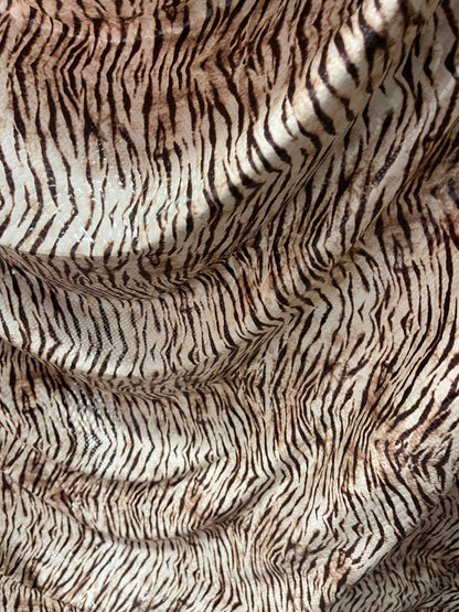 New Exotic Tiger design print on poly spandex 2-way stretch with clear foil 58/60” Sold by the YD. Ships Worldwide from Los Angeles CA